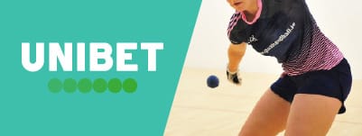 Logo of Unibet chosen as the best bookmaker for GAA Handball live betting site next to a player in action